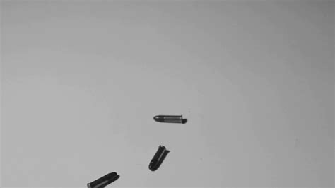 dropping bullet on metal surface to test|High.